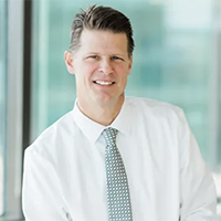 professional headshot of John Gaar